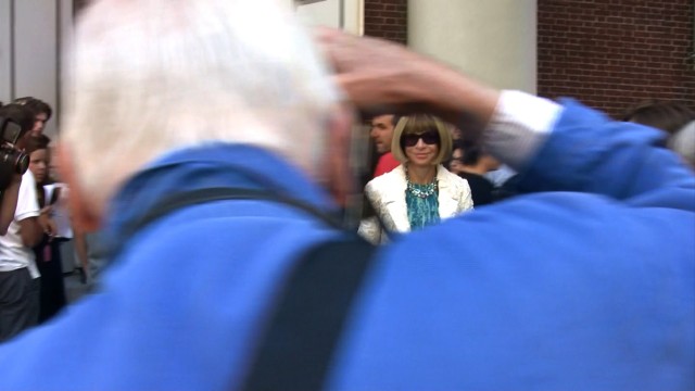 Bill Cunningham shooting Anna Wintour as she enters a fashion show during Fashion Week in New York City, from the feature-length documentary, "Bill Cunningham New York," ( 2010),  directed by Richard Press and produced by Philip Gefter.  TO BE USED ONLY WITH PRESS AND PROMOTIONAL COVERAGE OF THE FILM. NOT TO BE USED FOR ANY OTHER PURPOSE WITHOUT PERMISSION FROM THE FILMMAKERS credit: First Thought Films Contact Philip Gefter: philipgefter@gmail.com